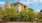 a large building with trees in front of it