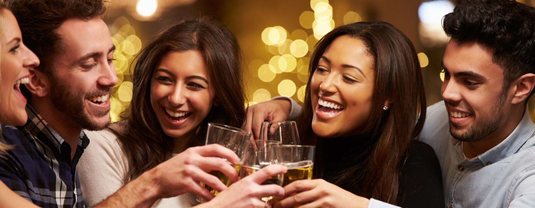 a group of people drinking beer