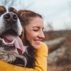 a person holding a dog