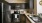 a kitchen with black appliances